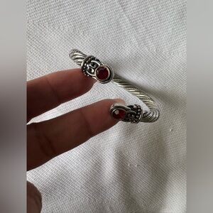 Intricate Silver Bracelet with Red Accents